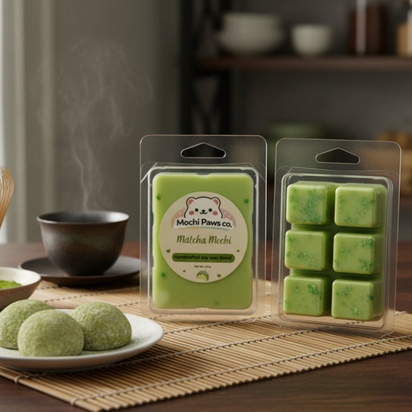 Green tea mochi and packaging on a table with a blurred background
