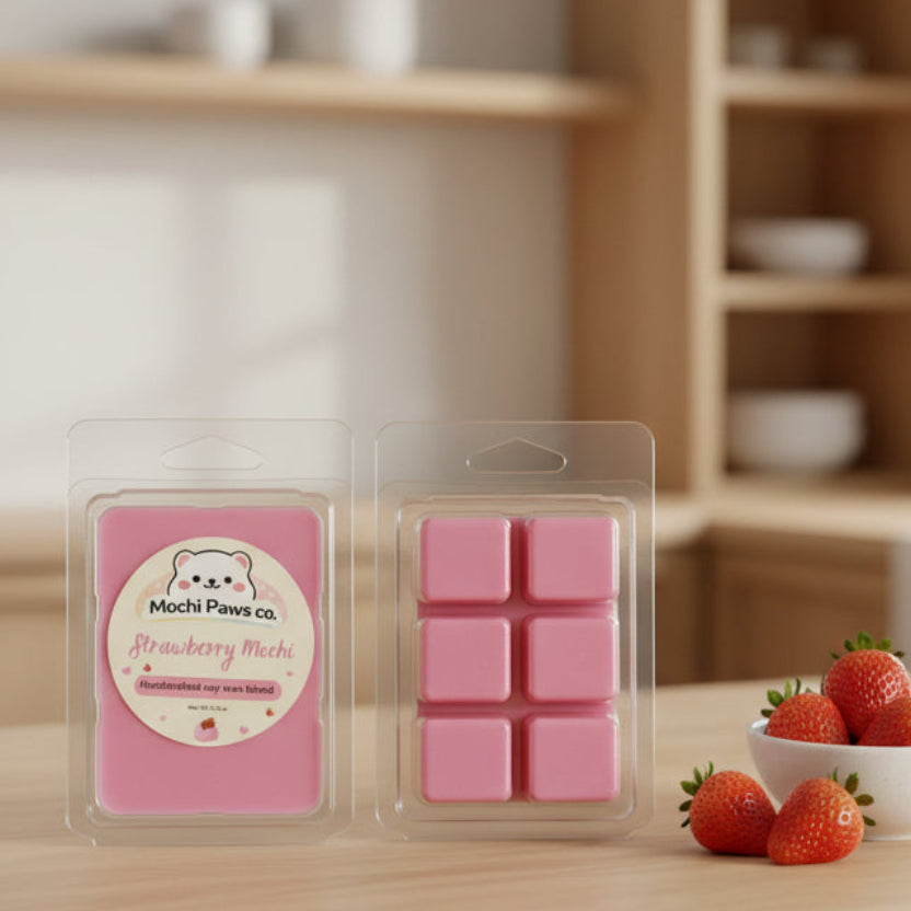 Pink wax melts in clear packaging with Mochi Paws Co. label on a gray background