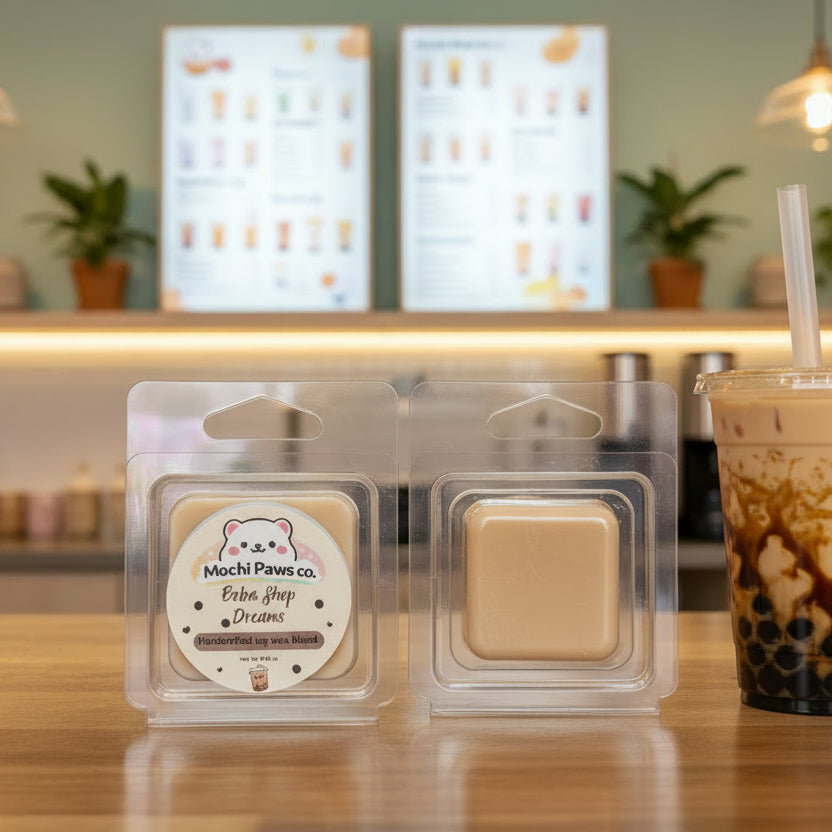 Two wax melts in clear packaging with 'Mochi Paws Co.' labels with a boba.
